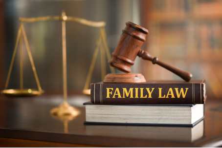 Family Law books on desk in law firm. Legal education about matrimonial law, law of domestic relations.